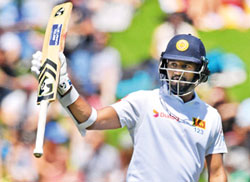 Niroshan, Dimuth and Angelo salvage Lankan pride