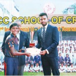 Savindu Silva of SSC BLUE, the Player of the Tournament, receiving the trophy and certificate from Sadeera Samarawickrama, the special guest