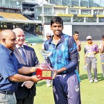 Captain-of-Stafford-International-Shriram-Shyamsunder-receives-the-champions-trophy-from-Arabind-de-Silva