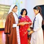 The Most Outstanding Student ( Senior ) Lavinka Weerasekara receiving her award