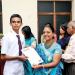 An Award winner receiving his  certificate from the Dean of College of Chemical Sciences Prof. Sagarika Ekanayake