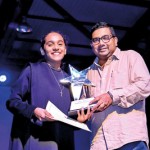 Shria-Nair-receiving-the-trophy-for-Best-Female-portrayal-by-the-Principal-of-Asian-International-School