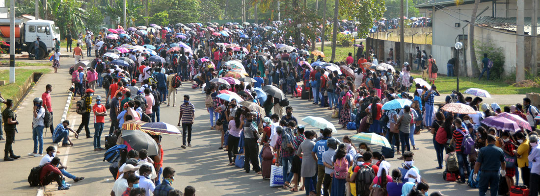 Chaos as thousands crowd transport home for Free Trade Zone workers