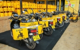 Specially designed motorbikes for  home delivery from LAUGFS Gas