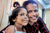 Smiles all round after mother  & daughter mark medical first