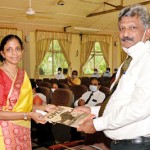 Indika-Bulnakulmae-handing-over-the-special-issue-of-the-Open-Quarterly-to-the-Vice-Chancellor-Prof.-S.A.-Ariadu