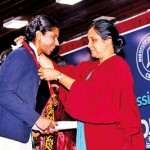 Olympiad-award-winner-recieving-her-award