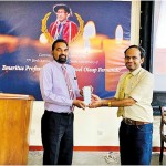 Eneritus Professor W S Fewrnando commemoration speech by Prof. Sudantha Liyanage receiving the token of appreciation.