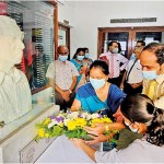 President Prof. Sagarika Ekanayake offering flower bouquet to the statue of late Prof. J N O Fernando.