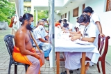Esala Perahera performers and Adhivasi members receive vaccine