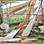 The temporary roof has come apart over the structure