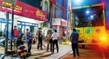 Police guard at Sathosa outlet after liquor dispute