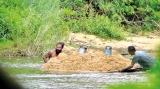 Politically-backed sand mining mafia wrecking Deduru Oya and livelihoods