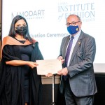 A Mod’Art Graduate receiving her certificate