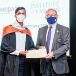 A LIFT graduate receiving his certificate