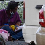 Beggars toting children are  a common sight in Colombo