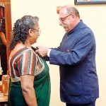 Roshani Leanage being awarded the Knight of the Order of Arts and Letters by French Ambassador to Sri Lanka and the Maldives H.E. Mr. Eric Laveru