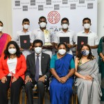 1st runner-up - Girls' High School Kandy - Team with teacher-in-charge, judges and ACCA officials.