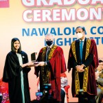 Receiving the award for the highest achieving student at the NCHS graduation ceremony 2022 for the foundation year (Science/Engineering)