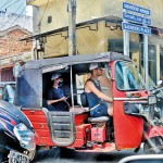 n	Join the joyride: Tourists try a drive in a threewheeler, Colombo