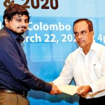 Best Environmental reporter of the Year (2020): Kasun Warakpitiya of the Sunday Times receives the certificate of merit from Ranjith Ananda Jayasinghe