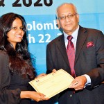 The Denzil Peiris Young Reporter of the year (2020): Tharushi Weerasinghe of The Sunday Times receives the certificate of merit from Kumar Nadesan