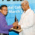 Upali Wijewardene Feature Writer of the Year (2020-English stream): Sandun Jayawardana of the Sunday Times receives the award from Nimal Welgama, Managing Director Upali Newspapers (Pvt) Limited