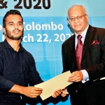 The Denzil Peiris Young Reporter of the Year (2019):  Buddhika Gayan Samaraweera of Ceylon Today receives the certificate of merit from Kumar Nadesan