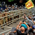 HoruGoGama - Face off: Police and protestors standby