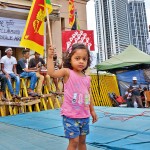 GotaGoGama- Waving flag: A young protestor