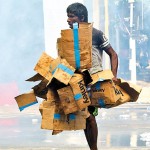 Colombo- Caught between: A cardboard collector in the midst of teargas