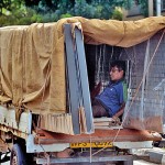 Nugegoda: 40 winks: A worker rests while transporting goods