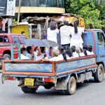 Colombo 9 - A to B: An elderly crowd use an uncomfortable means of transport