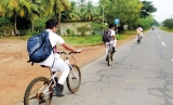 Students take to bikes amid fuel crisis