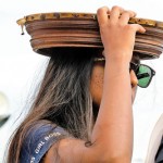 Galle Face- Braving the heat: A protestor shades herself from the elements Pix by M A Pushpa Kumara