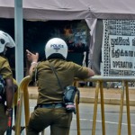 Galle Face Stand by: Police with gas masks on the ready for any eventuality