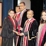 Mr. Sanjaya Bandara presenting  the scroll to a new Associate member  of CA Sri Lanka.