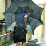 Colombo  Adverse weather: Strong winds and heavy rains make it harder to get about. Pix by Priyanka Samaraweera