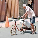 Colombo Wheel-barrow like: An older person transports heavy goods on a cycle.  Pic by Indika Handuwala