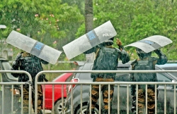 Rain dampens police move to rein in students