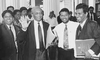 Bandula Padmakumara with his lawyers.