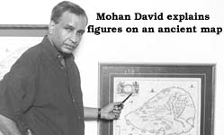 Mohan David explains figures on an ancient map