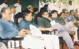 Mendis seated in the front row, few seats away from Ranil at the UNP  May Day rally in Kandy.