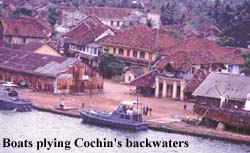 Boats plying Cochin's back waters