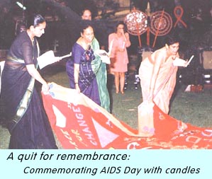 A quilt for remembrance: Commmemorating AIDS Day with candles