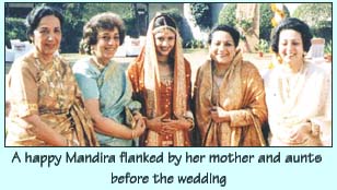 A happy Mandira flanked by her mother and aunts before the wedding