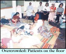 Overcrowded: Patients on the floor