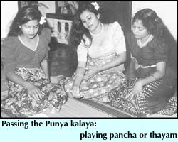 Passing the Punya kalaya:  playing pancha or thayam