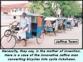 Necessity, they say, is the mother of invention. Here is a case of the innovative Jaffna man converting bicycles into cycle rickshaws.