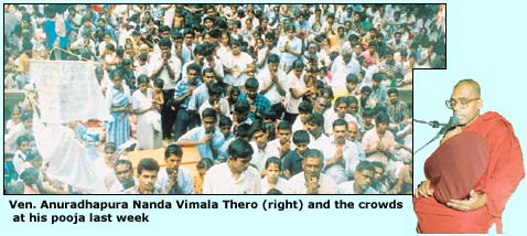 VenAnuradhapura Nanda Vimala Thero (right) and the crowds at his pooja last week